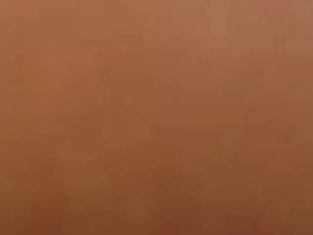 Nudist on the beach lets men touch her.MP4